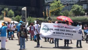 Activists march to end oil and gas exploration by Total Energies