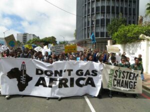 Climate activists march on Human Rights Day against fossil fuels