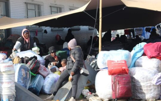 Baby born in a tent as African migrants camp outside Cape Town repatriation centre